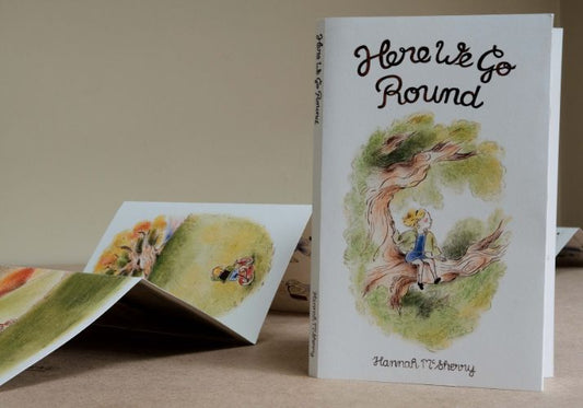 Book cover of Here We Go Round by Hannah McSherry