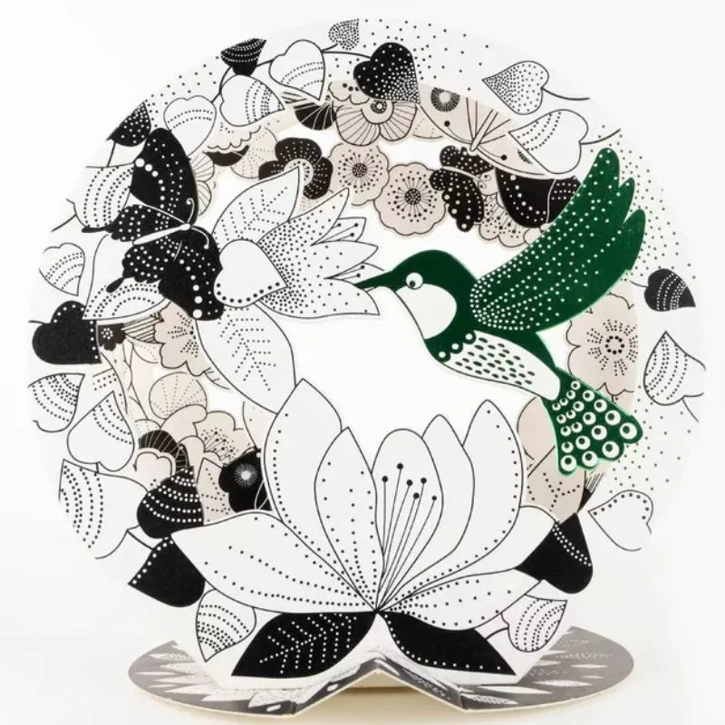 A black and white 3D Color Bulle - Humminbird Colouring Boards plate with a 3D hummingbird on it.