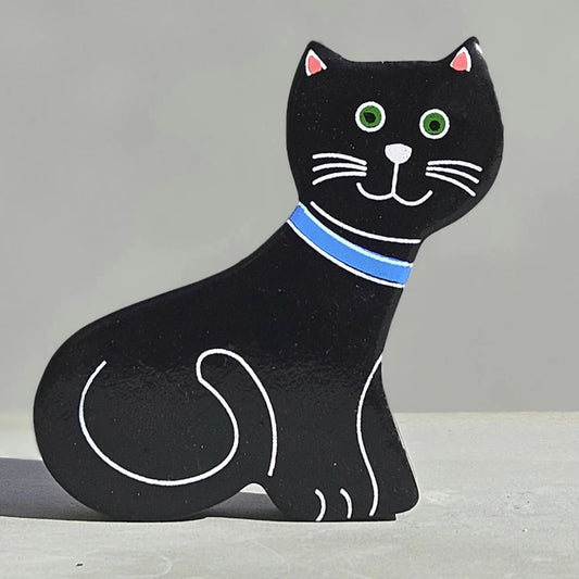 An interactive Magnetic Wooden Cat Play Figure with a blue collar.