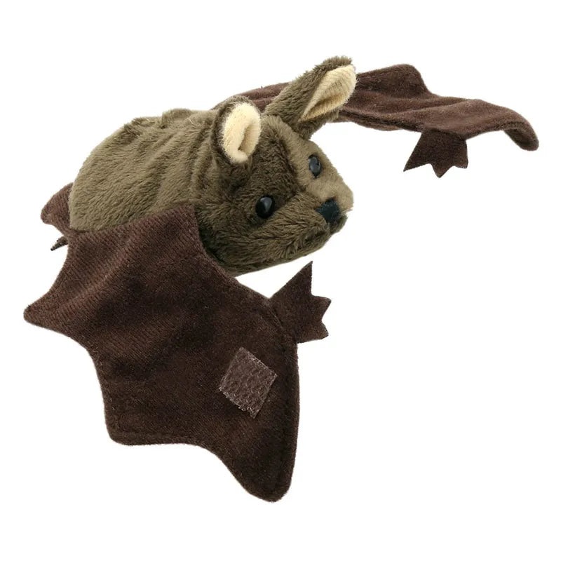 The Puppet Company Bat Finger Puppet features a furry brown body, large ears, and fabric wings, perfect for cozy storytelling adventures. Its black button eyes and velvety texture make it extra inviting.