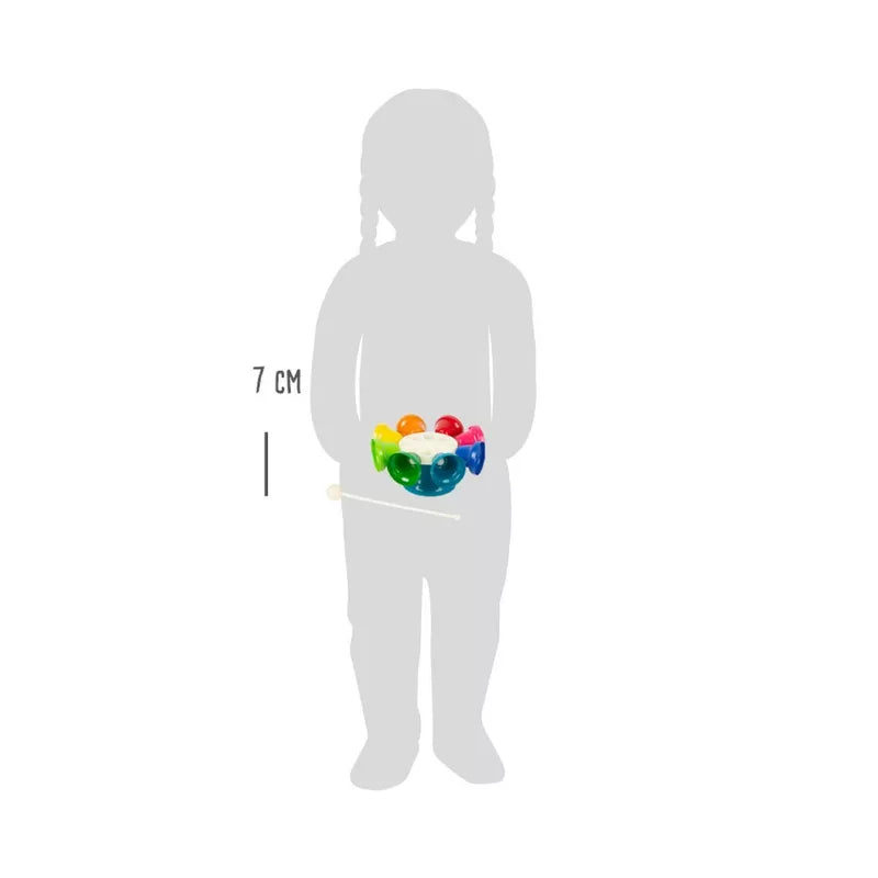 A person holding a Bells Carousel in their hands.