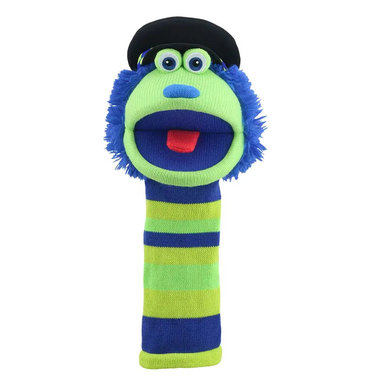 The Puppet Company Sockette Bobby is an eco-friendly hand puppet with blue fuzzy hair, green and blue stripes, blue eyes, a red tongue, and a black cap, made from recycled materials.