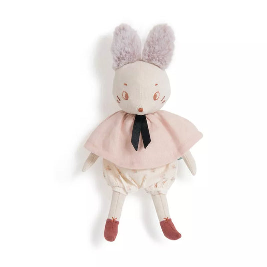 A Moulin Roty Brume the Mouse stuffed animal wearing a pink dress and a black tie.