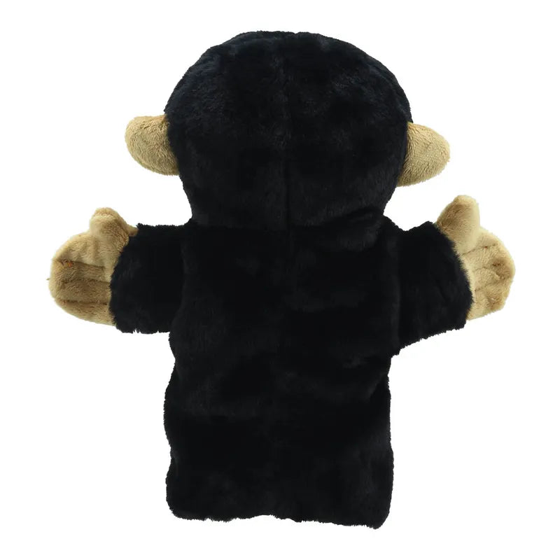 A plush toy in the shape of a bear seen from the back, featuring black fur with contrasting beige paws and inner ears, perfect for any ECO Puppet Buddies Chimp Hand Puppet collection.