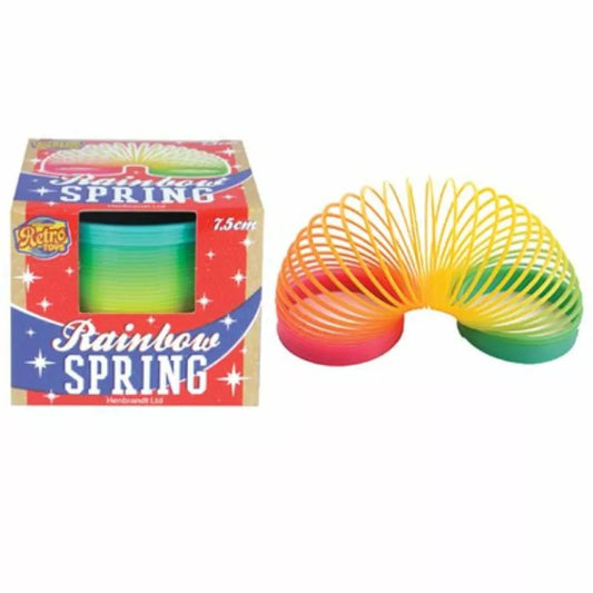 A colorful rainbow Coloured Springs 7.5cm displayed next to its packaging box labeled "retro rainbow spring," with a visible dimension of 7.5 cm on the box. This destress toy offers playful stress relief.
