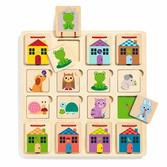 A Djeco Cabanimo Puzzle with animals and houses on it.