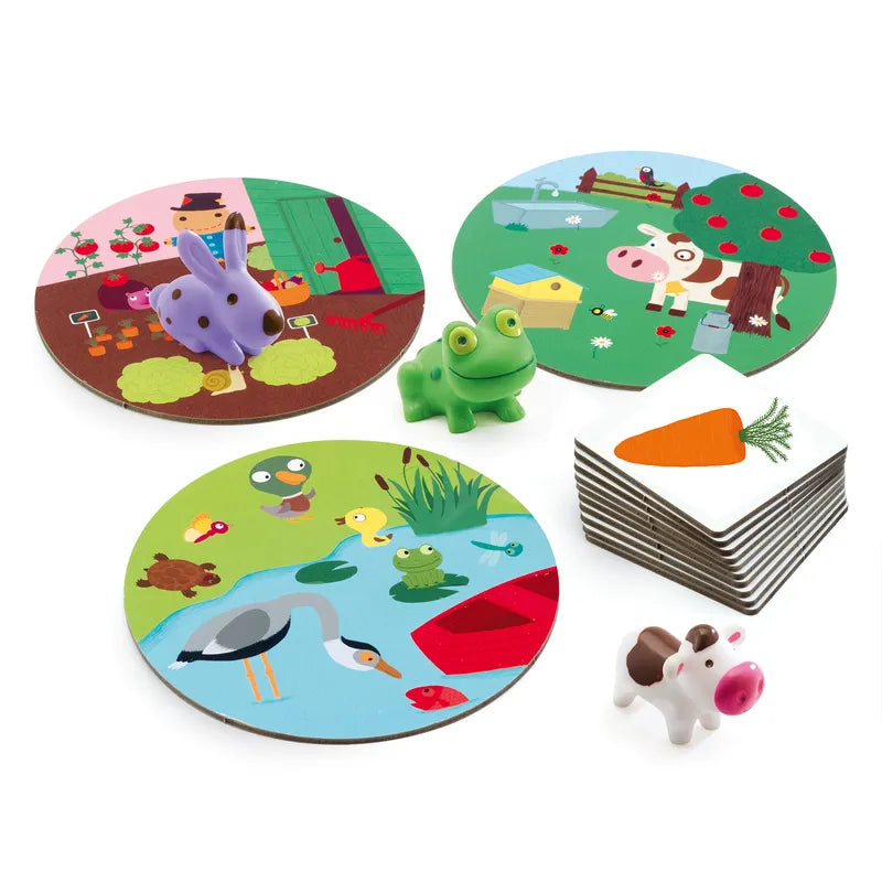 A set of Djeco Toddler Games Little association, each featuring different farm and pond animal scenes, along with a small stack of additional puzzle pieces.