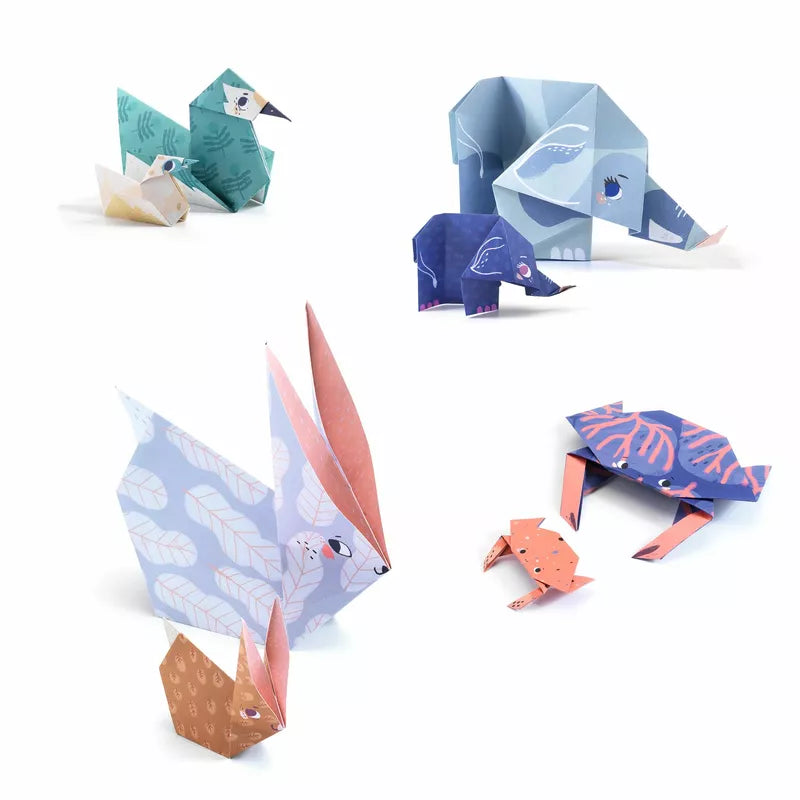 Description (modified): An ensemble of Djeco Origami Families on a white surface, delighting children and showcasing animal parents.