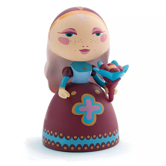A Djeco Arty Toys Anouchka figurine holding a bunch of flowers.