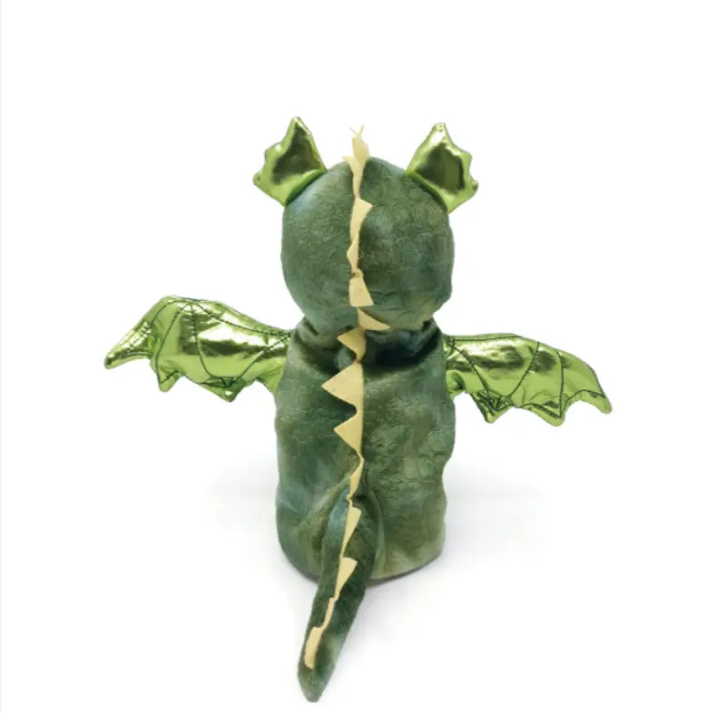 The Hand Puppet Dragon is a green plush toy shaped like a dragon, shown from the back, with shiny green wings, pointed ears, and a yellow zigzag spine—ideal for inspiring imaginative storytelling play.