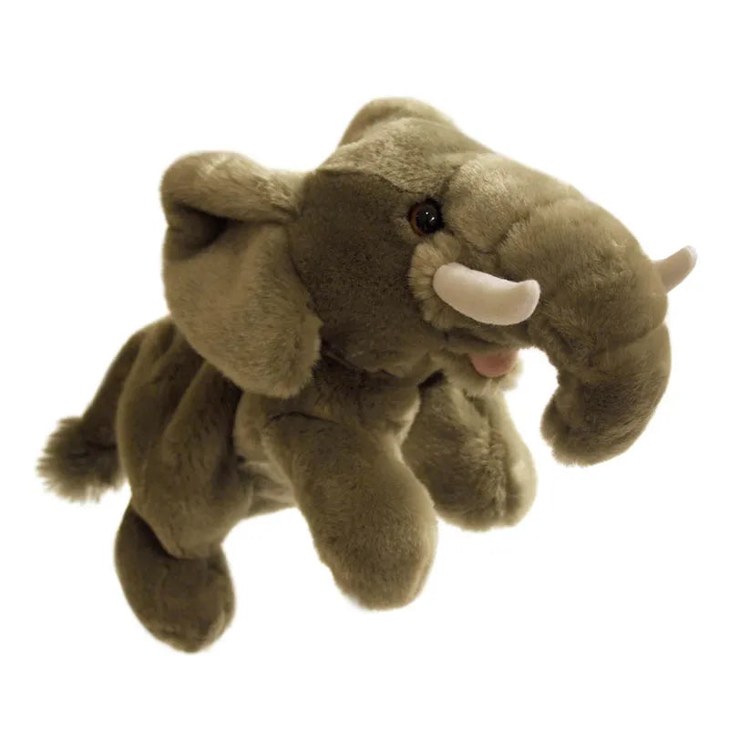 The Puppet Company Full-bodied Hand Puppet Elephant, a soft brown elephant with white tusks, large floppy ears, and a small tail, is displayed against a plain white background.