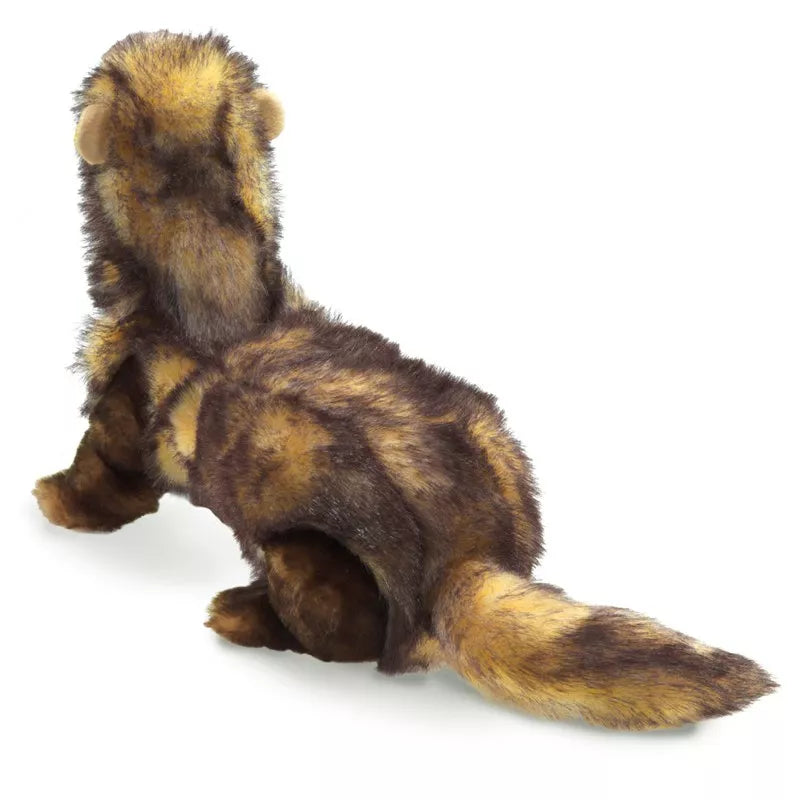 A Folkmanis Puppets Ferret that is laying down.