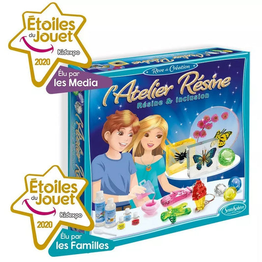 A children's board game with a picture of a girl and a boy, including a Sentosphere Resin Workshop.