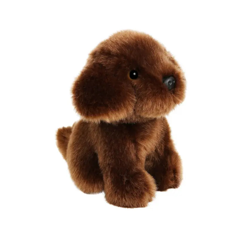The Wilberry Mini Brown Labrador is a plush toy with floppy ears and a black nose, sitting upright against a white background.