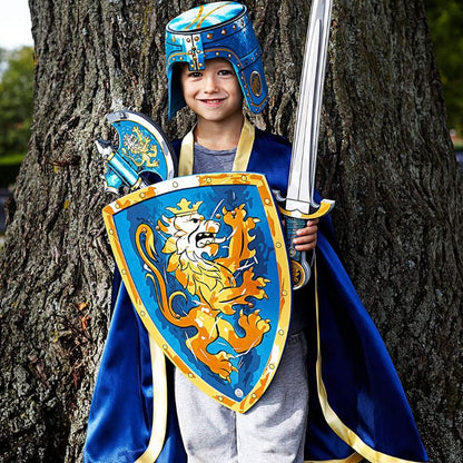 a boy dressed as a knight with a Liontouch Noble Knight Axe and shield.