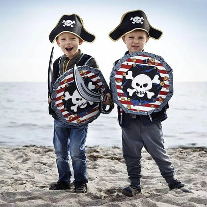 two boys dressed up as Liontouch Pirate Sabre Captain Red Stripe on the beach.