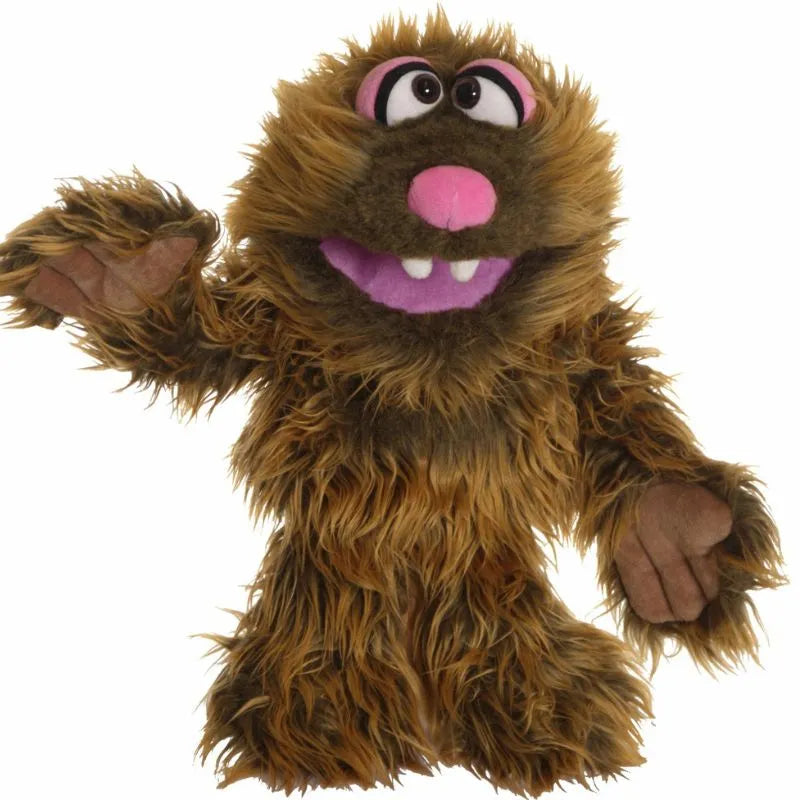 The Living Puppets Zoff Hand Puppet is soft and fluffy with brown hair, wide eyes, a pink nose, purple lips, and visible teeth. It has a friendly expression and waves one hand, making it perfect for interactive adventures with a touch of monster hand puppet magic.