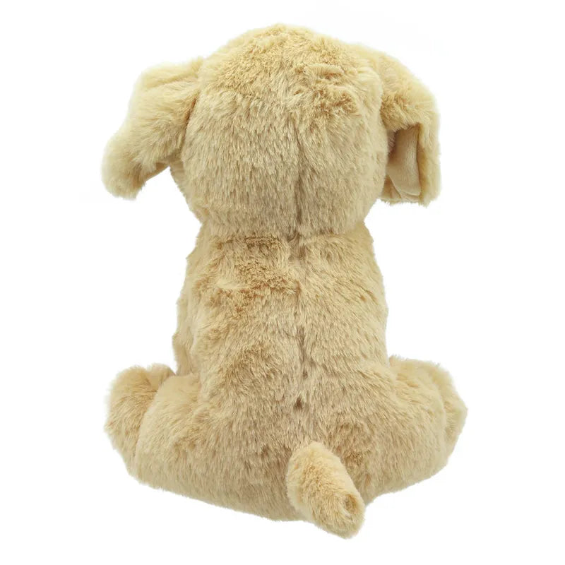 Lola the Labrador ECO Cuddlies, a plush toy made from recycled materials, sits with its back facing the camera. Its soft light brown fur and droopy ears reveal a small tail, showcasing an irresistibly adorable cuddly appearance.