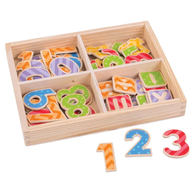The Bigjigs Magnetic Numbers set is an educational toy featuring a wooden box with four compartments containing brightly colored numbers and shapes, including orange 1, blue 2, and red 3, with vibrant, patterned designs.