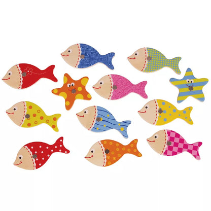 A bunch of colorful fish from the New Classic Toys Magnetic Fishing Game on a white background.