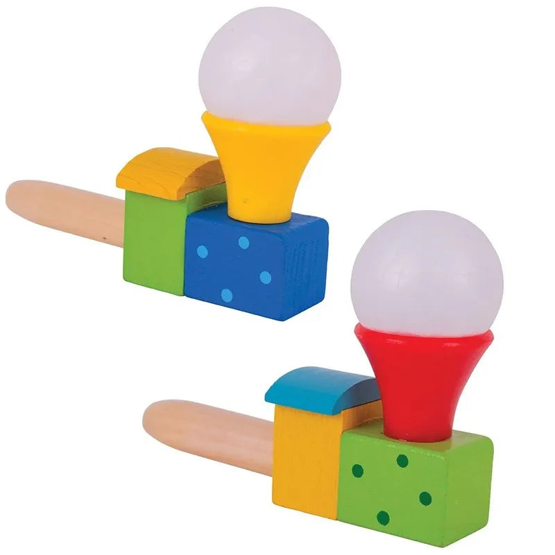 The Bigjigs Puffing Train includes a pair of vibrant wooden puffing toys with blocks and round tops. One toy features a yellow base topped with a red cone, while the other showcases a blue base with a yellow cone. Ideal as stocking fillers, these toys have handles in blue, green, and yellow segments designed to help develop mouth muscles.