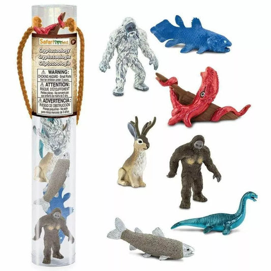A TOOBS® Figurines Cryptozoology tube containing a variety of animal figurines.