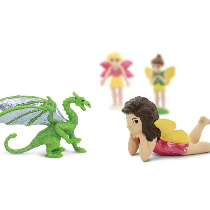 a set of TOOBS® Figurines Fairies & Dragons with a dragon and a girl.