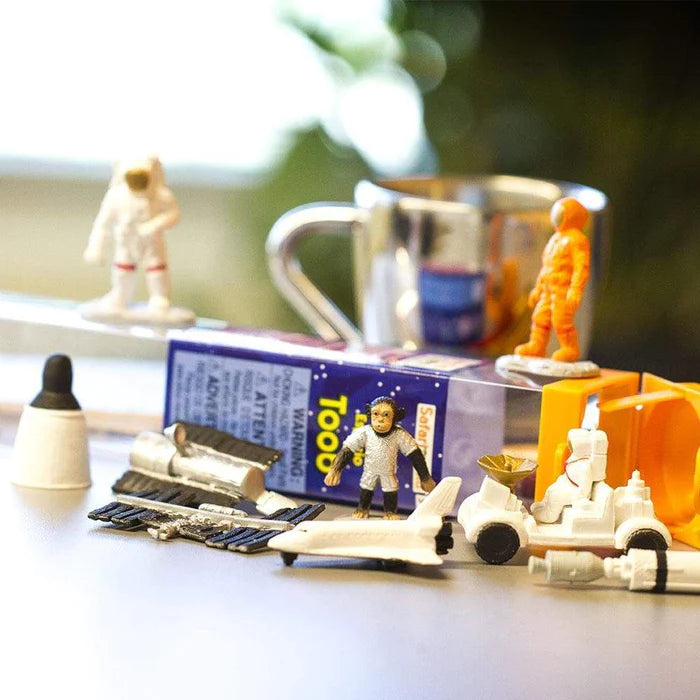 a group of TOOBS® Figurines Space on a table.
