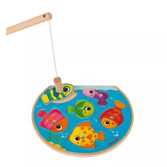 Colorful wooden Janod Speedy Fish Puzzle Magnetic Game designed for toddlers, with a magnetic fishing rod poised to catch one of the illustrated fish on a vibrant underwater-themed board.