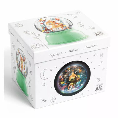 A white box with a green lid and a picture of Djeco Snow Ball Nightlight Fawn on it.