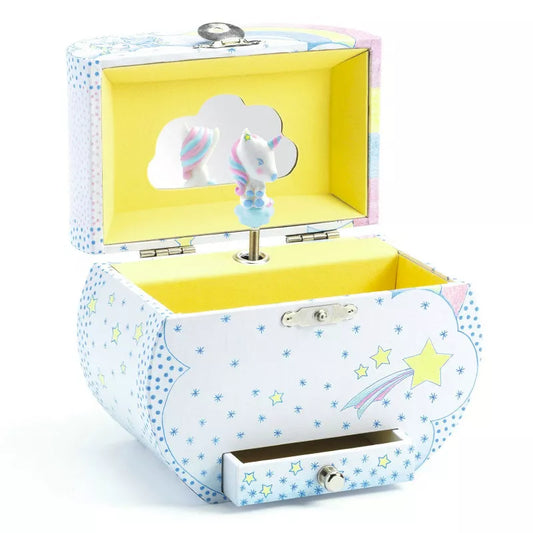 An open box with the Djeco Musical Box Dreams of Unicorn in it.