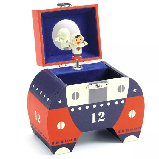 A Djeco Musical Box Polo 12 with a little boy inside of it.