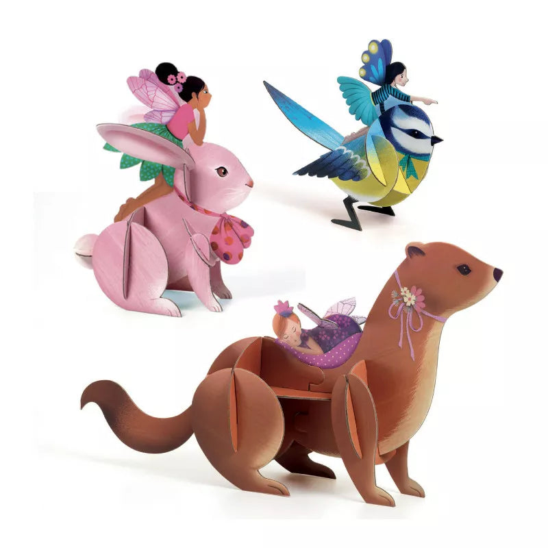 A group of Djeco Multi Activity Set Fairy Box toy animals sitting next to each other.