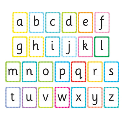 Bright and colorful Orchard Toys Alphabet Flashcards feature lowercase letters from a to z, each encased in a unique checkered border in vibrant colors including yellow, green, blue, pink, and purple. The cards are organized into four neat rows.