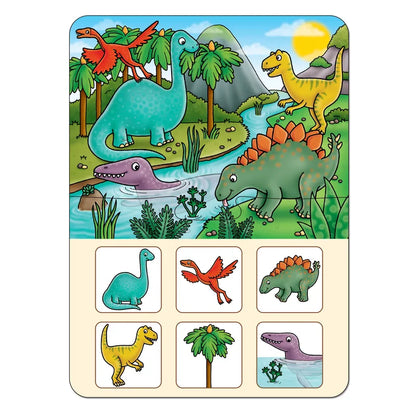 The Orchard Toys Dinosaur Lotto features a vibrant scene of diverse dinosaurs roaming in a prehistoric landscape, complete with mountains, trees, and a river. Beneath this captivating depiction are small tiles showcasing illustrations of individual dinosaurs that match those found in the main artwork.