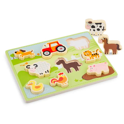 The New Classic Toys Chunky Farm Puzzle is a vibrant wooden puzzle showcasing an array of farm animals and a tractor. This charming wooden toy contains pieces shaped like a dog, cow, horse, pig, goat, duck, sheep, rooster, and a tractor. For added fun, the cow and horse pieces can even stand upright beside the puzzle board.