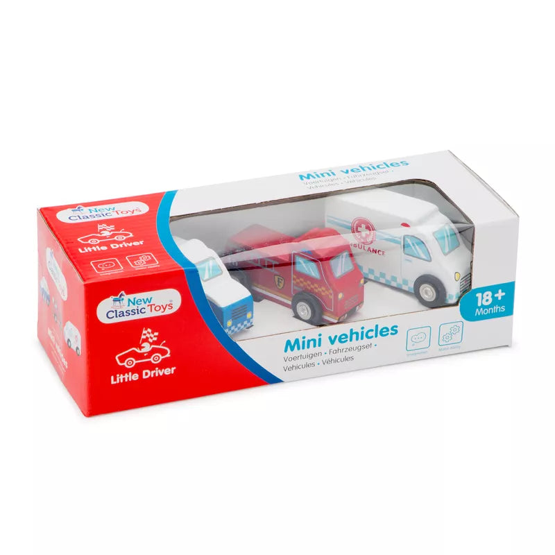 A delightful boxed set, ideal for young car enthusiasts, features three miniature wooden vehicles: a fire truck, an ambulance, and a police car. The box is labeled "Mini Vehicles" and is suitable for children aged 18 months and older. The brand "New Classic Toys" is prominently displayed.