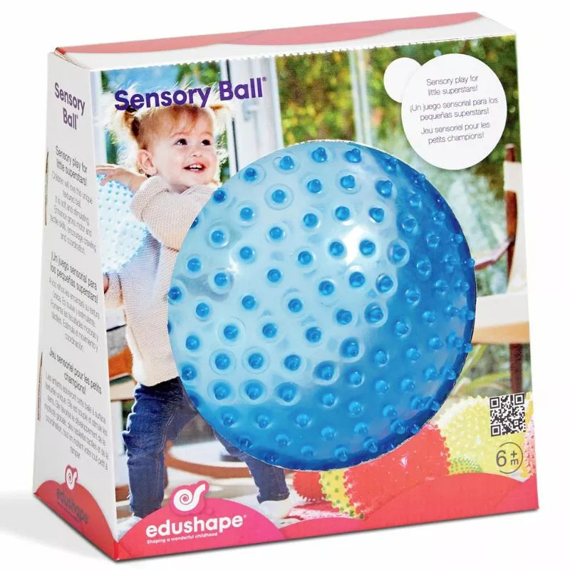 A blue Edushape 18cm See Me Sensory Ball designed to enhance motor skills, in a box.