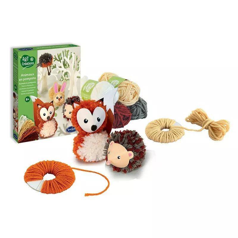 A Sentosphere Animals in Pompoms kit with a hedgehog and a box of yarn to make pompoms.