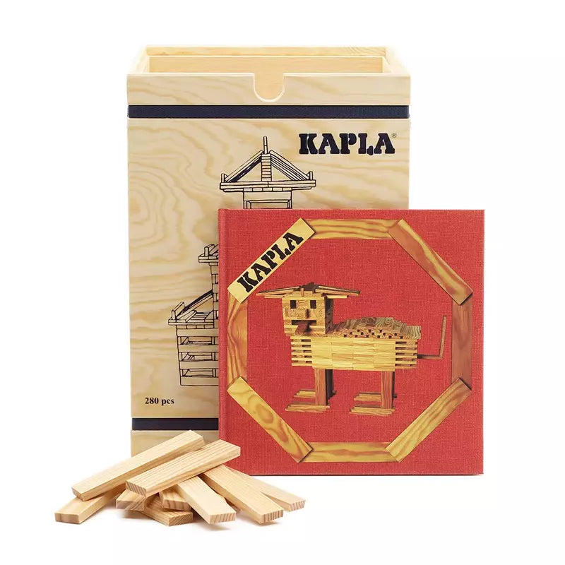 A set of KAPLA® Construction 280 Planks in Wooden Box with a red instruction booklet, showcasing a design of a sheep, and some planks arranged in front on a white background. The package in