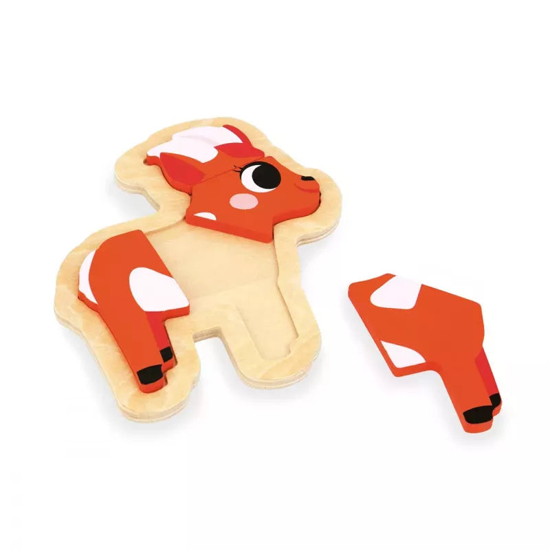 A Janod 4 Progressive Puzzle - Farm piece in the shape of a cute red and white farm animal pony next to its corresponding slot on a puzzle board.