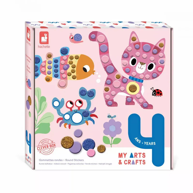 A colorful box for a children's arts and crafts kit. The front shows a playful pink cat, a blue and red crab, and a multicolored fish made with round stickers. The box is labeled "4+ years" and "Janod 4 Years - Round Stickers," designed to enhance fine motor skills. The brand logo and name "hachette" appear at the top.
