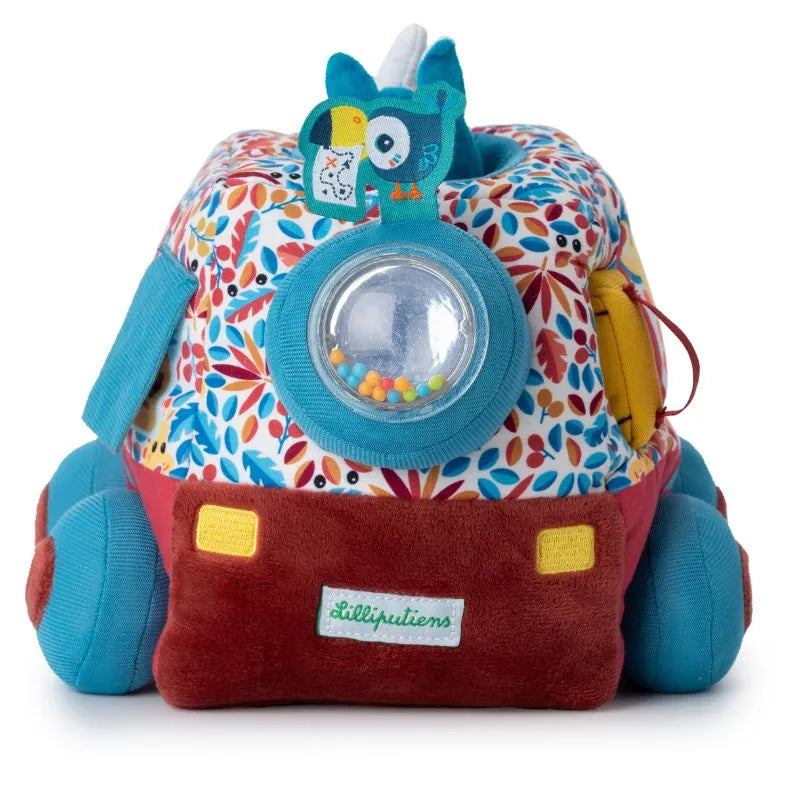 The Lilliputiens I'm Discovering Activities Car Safari is a lovely first baby toy—a colorful cube with floral patterns and varied textures, topped by an owl. It includes a transparent rattle with tiny beads and features Lilliputiens’ branding on the front, making it an ideal baby gift.