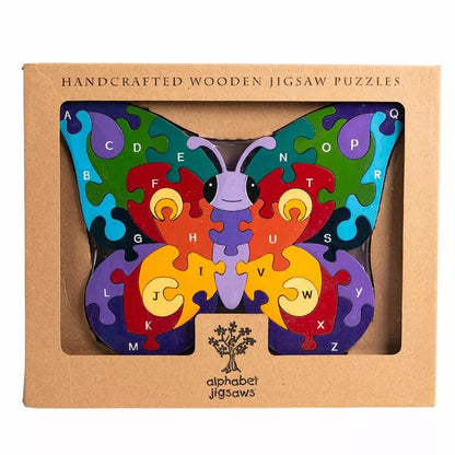 A wooden jigsaw in the shape of a  Butterfly. Each piece has a different colour and an alphabet letter on it.