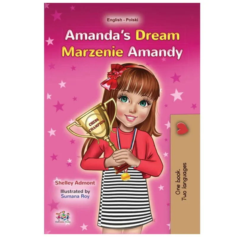The cover of Dual Language Book Amanda's Dream English/Polish Children's Book features a smiling girl with brown hair, red bow, striped dress, and gold trophy on a sparkling pink background. Text appears in both English and Polish.