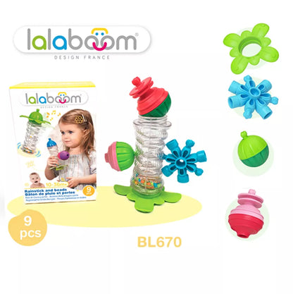 A picture of Lalabooom Rain Stick 7 Beads - 9 PCS toy set with a girl.