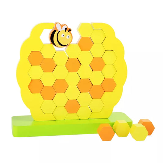A Beehive Wobbly Tower puzzle with a bee on top of it.