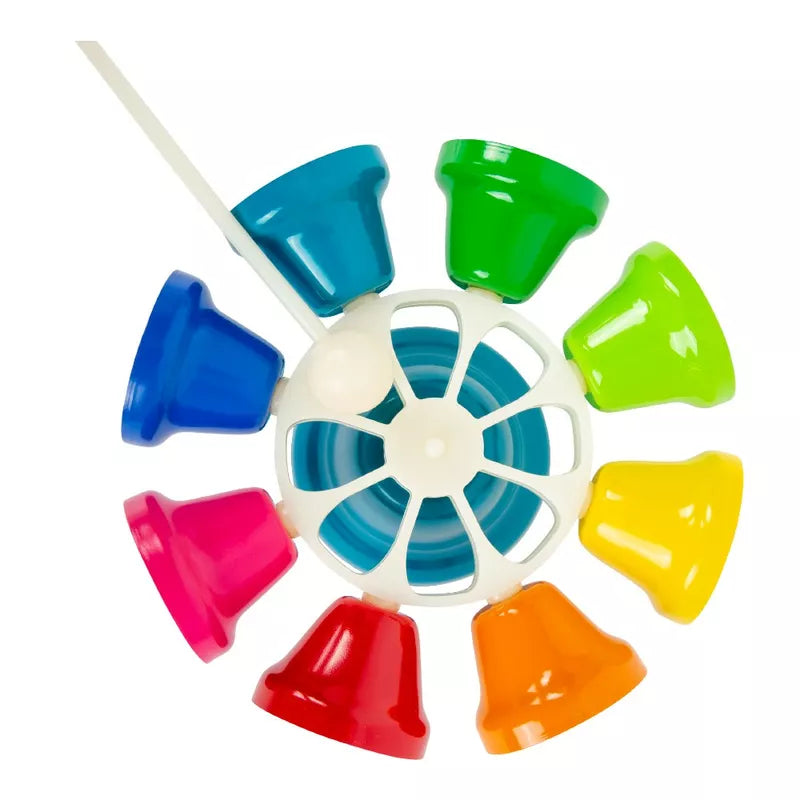 a multicolored plastic spinning toy with a white handle.