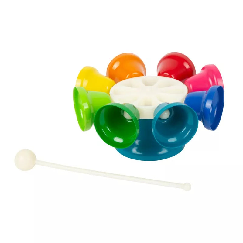 A colorful Bells Carousel toy with a white stick in front of it.