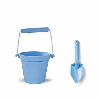 A Powder Blue Eco Bucket & Spade with a matching shovel next to it.